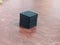 3D printed small black cube