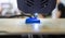 3D printer. 3D printer printing process close-up. 3D printer creating object