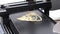 3D printer for liquid dough. 3D printer printing pancakes