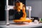 3d printer, with robotic arm moving in precise movements to 3d print object
