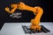 3d printing robot, with its arm moving in precise movements, to create new object