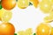 3D realistic citrus background with flying oranges and lemons, with blur effect. Falling lemon and orange fruits are whole and cut