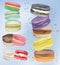 3d realistic colorfulul macaroon falling or flying. Differend sweet french macaroons in motion. France sweet desert