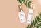3D Realistic sun Protection Cream Bottle on beige Background with palm leaves and podium. Design Template of Fashion Cosmetics