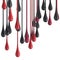 3D red and black glossy paint drop blobs