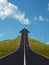 3D red car on arrow road pointing up, upward over a mountain to sky background