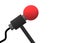 A 3D red microphone with grey handle and black wiring cable stand white backdrop