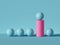 3d render, abstract minimal geometric background. Blue balls, pink cylinder podium. Isolated objects, primitive shapes.