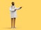 3d render. African cartoon character doctor gives recommendation. Medical clip art isolated on yellow background. Professional