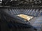 3D render of a beautiful sport arena for basketball with floodlights and gray seats