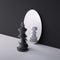 3d render, chess game king piece stands in front of the round mirror with pawn reflection. Contradiction metaphor. Perceptual