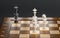 3d render chessboard with two knights checkmate on black background