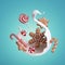 3d render, Christmas gingerbread cookies, milk splash and candies isolated on turquoise blue background. Holiday food and drink cl