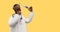 3d render. Doctor african cartoon character thinks and holds thermometer device, medical clip art isolated on yellow background