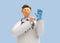 3d render. Doctor cartoon character with stethoscope wears blue latex glove. Clip art isolated on blue background. Professional