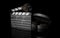 3D render of film clapperboard with reel