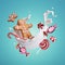 3d render, gingerbread man, assorted cookies and caramel candies levitate inside the milk splash, isolated on blue background.