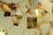3d render, golden modern shattered wall texture, random clusters digital illustration, abstract geometric background