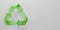 3D render green Recycle icon, recycle symbol isolated on white background. Shiny recycling symbol. Rotation arrow icon pack. Reuse