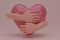 3D render hands hugging a pink heart with love. Hand embracing white heart isolated on pink background. Love yourself. used for