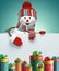 3d render, happy snowman character holds blank banner, decorated with stack of gift boxes. Winter holiday greeting card template