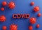 3d render illustration. Volumetric red inscriptione COVID and 3d model virus on a blue background . Concept, template design