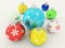 3D render of multicolor holiday decoration baubles