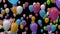 3d render multicolored balloons on a black background