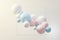 3d render of pastel ball, soaps bubbles, blobs that floating on the air isolated on pastel background. Abstract scene