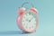 3D render of pink alarm clock isolated on blue background