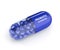 3d render of probiotic pill with granules over white