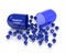 3d render of probiotic pill with granules over white