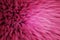 3D Render of shaggy carpet with wool material for backgrounds texture, close up of soft romantic pastel pink and fluffy