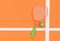 3D Render Sport equipment tennis racket with a ball on Orange Background