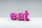 3D render of the word EAT in bubbly pink letters