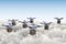 3D rendered illustration of many drones flying above the clouds