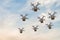 3D rendered illustration of many drones flying in the sky and delivering packages