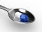 3d rendering of antibiotic pill in spoon