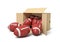 3d rendering of balls for American football inside and in front of cardboard box.