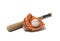 3d rendering of a baseball lying inside a large leather glove near a wooden bat on a white background.