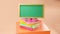 3D Rendering of a blank blackboard to put text on books on orange background. Realistic 3d shapes. Education concept. Come back to