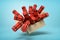 3d rendering of cardboard box full of dynamite bundles in mid-air on light-blue background.