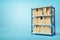 3d rendering of cardboard boxes on metal racks on blue background