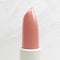 3D rendering closeup lipstick on white marble background