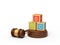 3d rendering of colorful alphabet toy blocks on round wooden block and brown wooden gavel