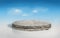 3D rendering concrete cement floor on circular layered soil stage, realistic 3D round podium isolated on blue sky