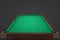 3d rendering of an empty billiard table on a dark background.