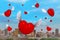 3D Rendering of  a Flock of Red Hearts with Angel Wings Fly Above a City