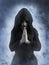 3D rendering of a ghost nun praying.