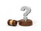 3d rendering of hefty stone question mark standing on sounding block with gavel beside.